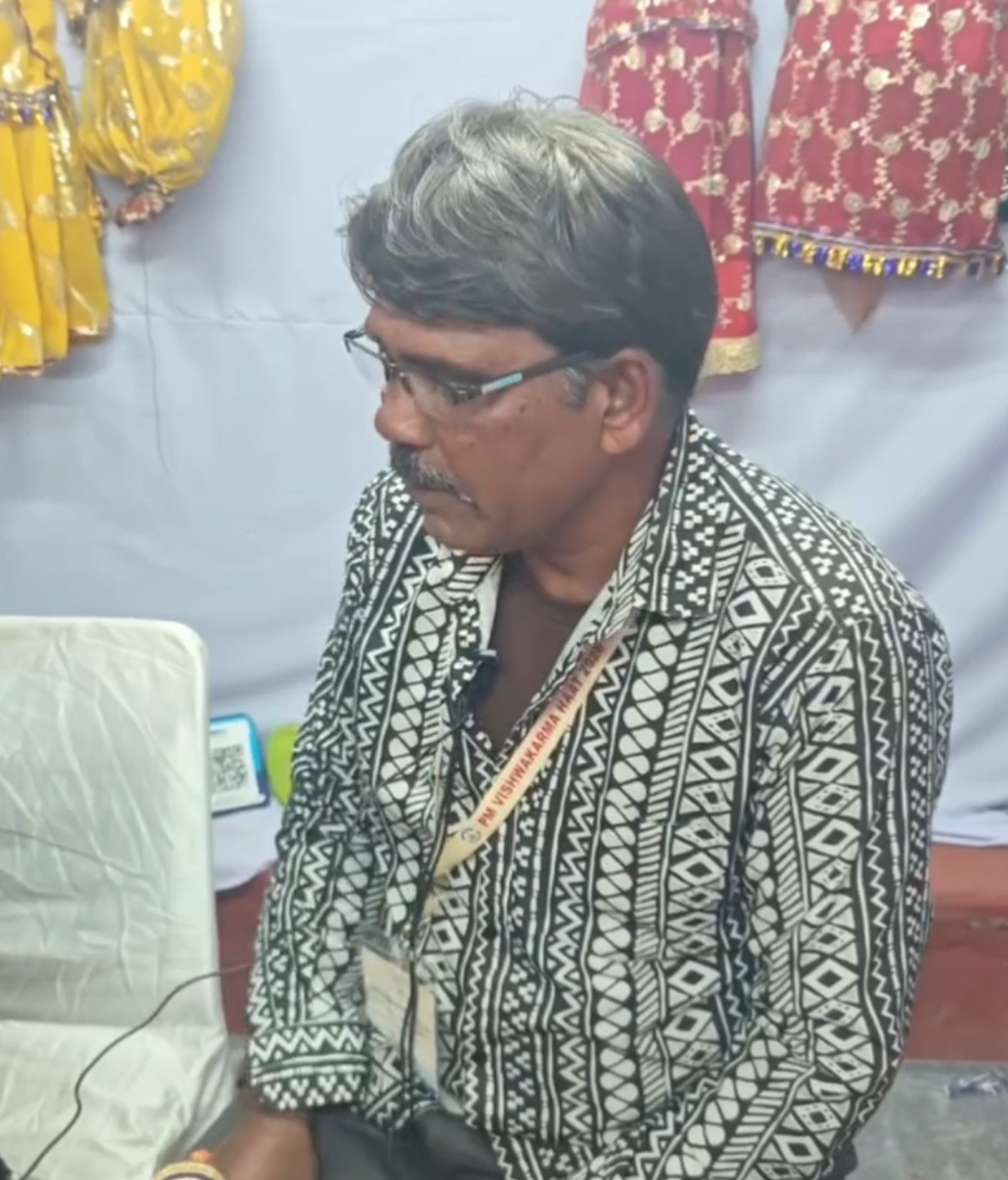 Artist documenting living cultural heritage at a community event