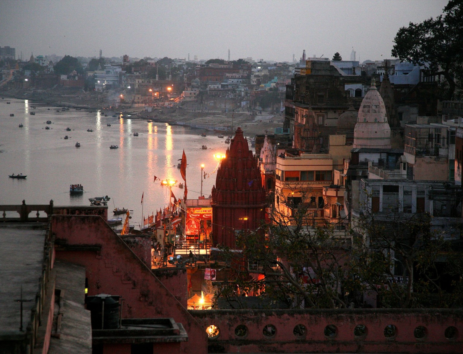 Riverside temple scene in India at dusk